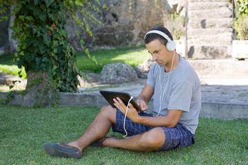 man relaxing with tablet pc