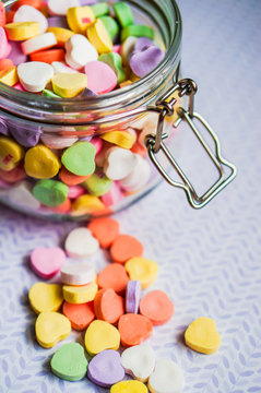 Closeup of heart candies with message