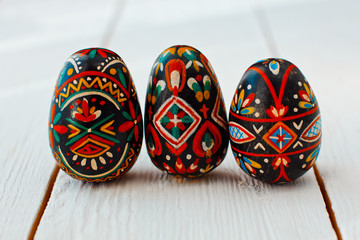 Beautiful Easter egg in hand schedule on the white boards