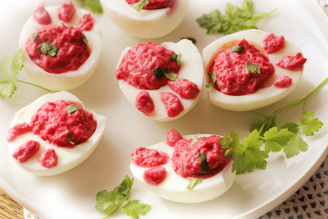 deviled eggs ( Bunny feet ) with beet