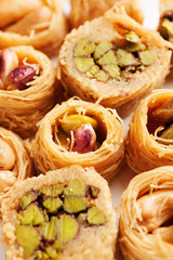 Oriental sweets on a white plate close-up shot