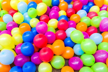 Fototapeta na wymiar Colorful balloons background, soft focus.