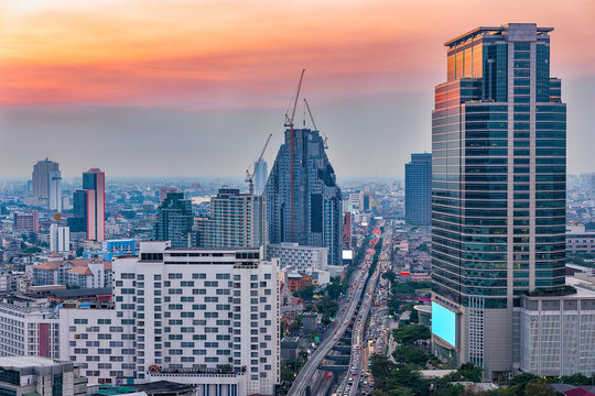 Bangkok city aerial view at twilight, business district with hig