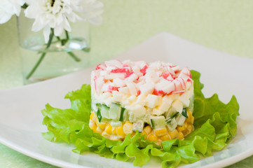 Layered salad of crab sticks and corn