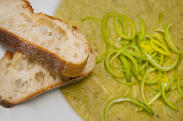 Fresh leek soup with two slices of home made baguette