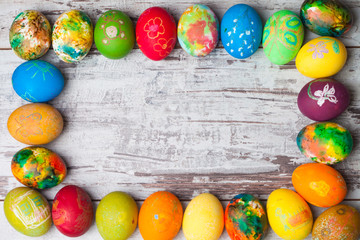 Easter eggs on rustic wooden background