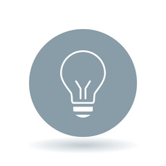 Halogen lightbulb icon. Light bulb sign. Light electricity symbol. White lightbulb icon on cool grey circle background. Vector illustration.
