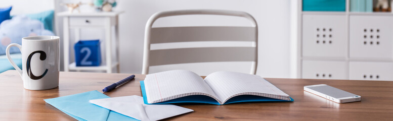 Messy desk of schoolchild