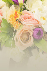 bouquet of artificial flower in vintage tone