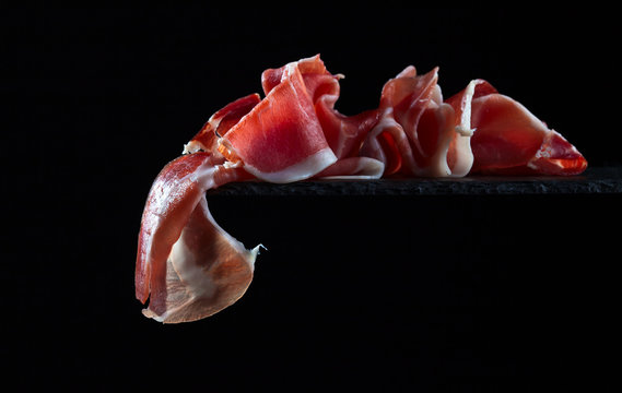 Jamon On A Black Background