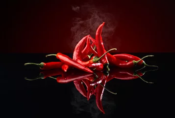 Foto auf Acrylglas Scharfe Chili-pfeffer Strahl roter Chilischote