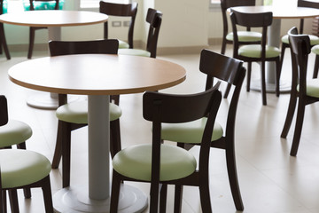 wooden and table chair in food court