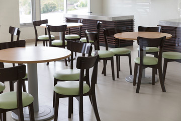 wooden and table chair in food court