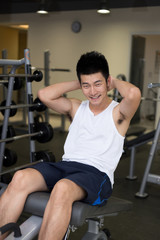 Fototapeta premium young man working out in modern gym