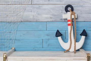 anchor on wood background blue and white - obrazy, fototapety, plakaty