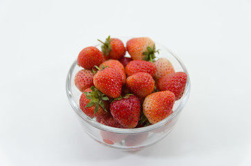 Juicy, fresh strawberries in a bowl