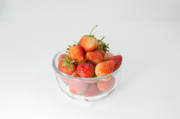 Juicy, fresh strawberries in a bowl