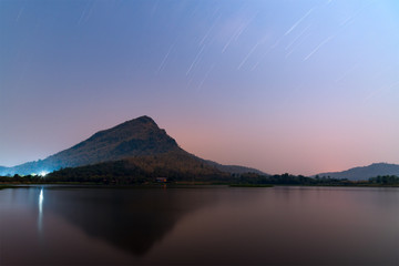 Long exposure image of mountain reflex on the lake under star an