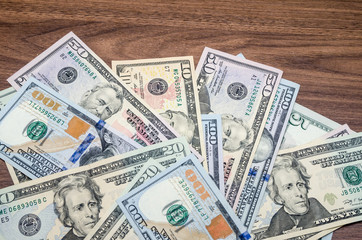 different dollar face-value banknotes on table