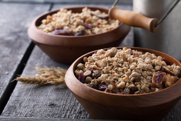 Healthy breakfast of muesli with milk and seeds