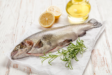 Fresh trout on white wood