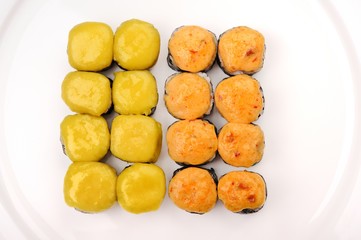 Japan omelette rolls with tomatoes served with ginger, black ses