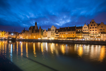 Fototapeta na wymiar Night view of Old Town and Motlawa river in Gdansk, Danzig