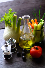 Olive oil with pepper mill tomato