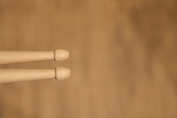Drum sticks lay on an drum set