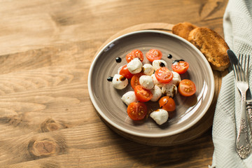 Caprese Salad with Mozzarella Cheese and Tomatoes