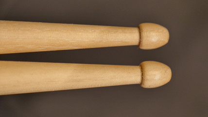 Drum sticks lay on an drum set