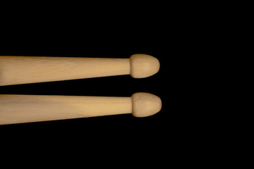 Drum sticks lay on an drum set