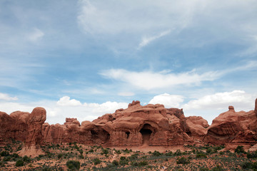 Fototapeta na wymiar The red rock formations of Arches National Park in Utah are the result of thousands of years of wind and water activity.