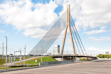 Fototapeta na wymiar Suspension bridge on the river Daugava of Riga, Latvia