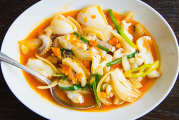 Stir fried squid with salted egg yolk (Thai Food)