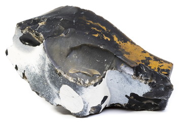Black flint stone isolated on white background