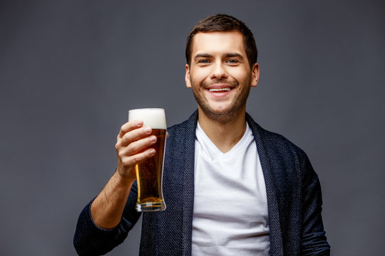 Cheerful young man in smart casual wear