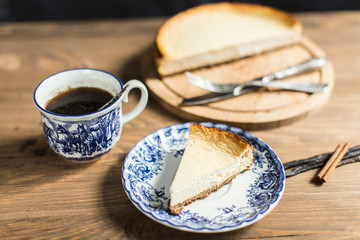 Cheesecake on plate with coffee