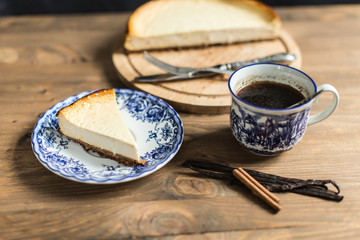 Cheesecake on plate with coffee