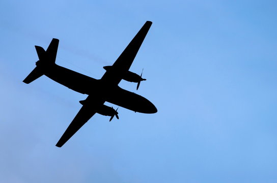 airplane silhouette against the sky
