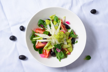 salad of tomatoes and greens