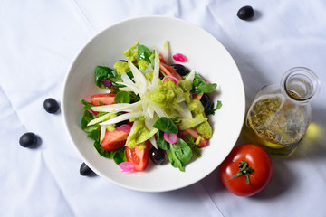 salad of tomatoes and greens