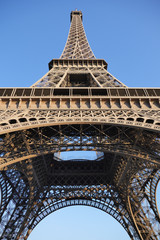 Low Angle View Of Eiffel Tower Against Blue Sky