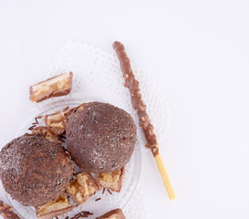 Cupcake with chocolate on white background