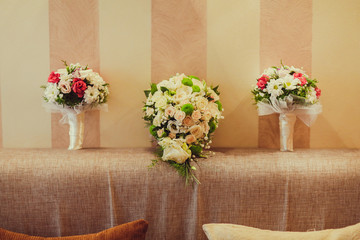 Beatiful bride with boquet in the hend