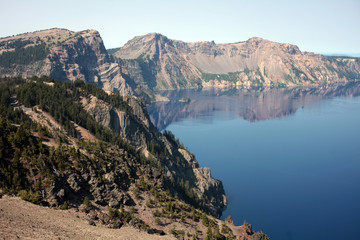 Fototapeta na wymiar Crater Lake, the seventh deepest in the world, was formed after the explosion of Mount Mazama about ten millennia ago, and it is now Oregon’s only national park.