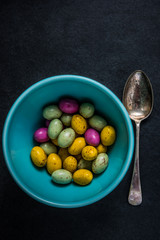 Traditional Easter chocolate eggs in bowl