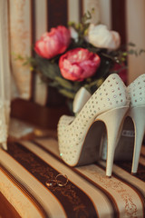 Beautiful bride's white shoes