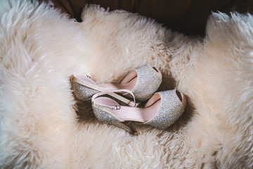 Beautiful bride's white shoes