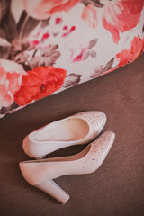 Beautiful bride's white shoes